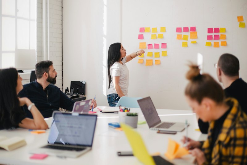 Agile product team sprint planning with sticky notes board
